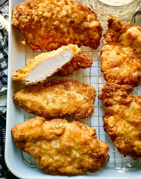 A delicious plate of BEST Fried Chicken Breast (Crispy Pan Fried Breasts Recipe)