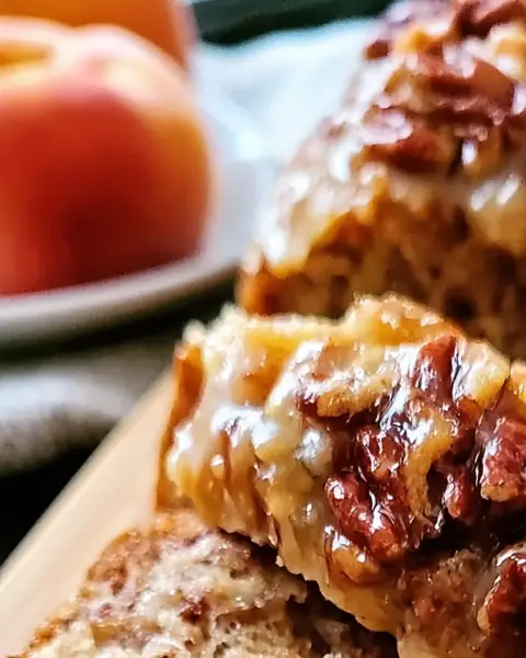A delicious plate of Irresistibly Easy Peach Pecan Bread