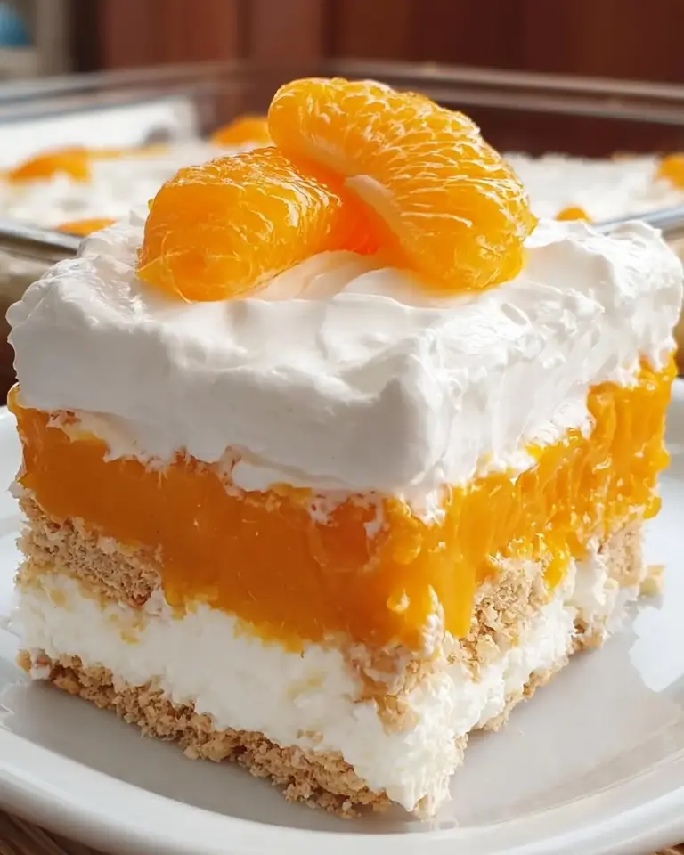 A delicious plate of No Bake Orange Dreamsicle Lasagna